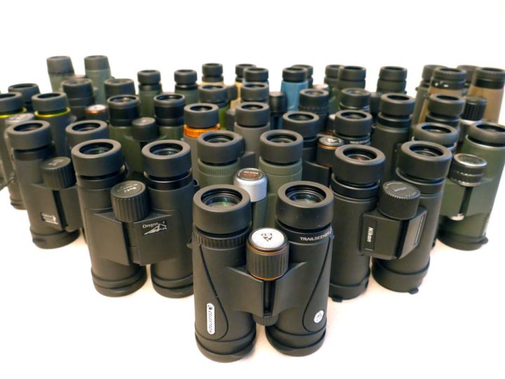 a group of binoculars arranged on a table